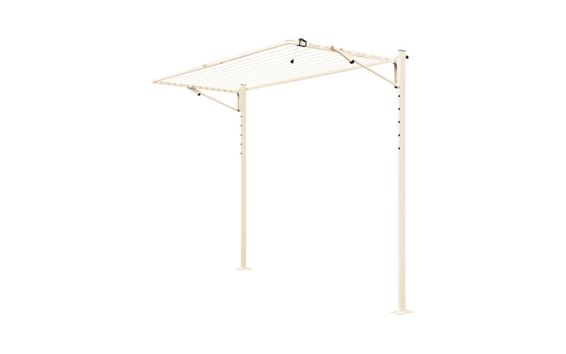 Austral Compact folding clothesline in Classic Cream, free-standing on a plated ground mount kit for hard surfaces