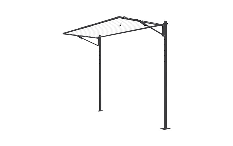 Austral Compact folding clothesline in Monument, free-standing on a plated ground mount kit for hard surfaces