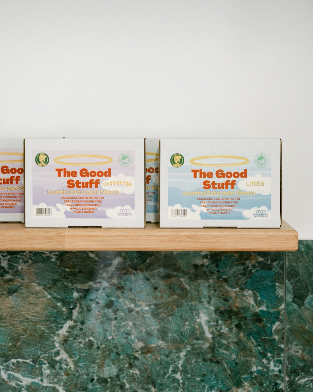 The Good Stuff Laundry Detergent Sheets in Linen and Unscented on a laundry shelf