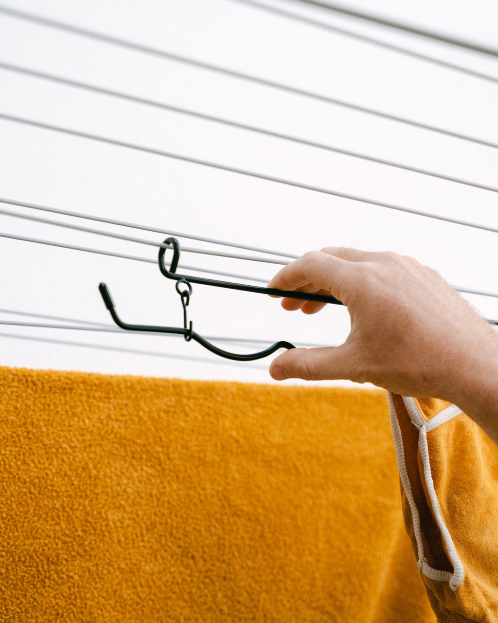 Hooking The Undie Hanger onto a clothesline